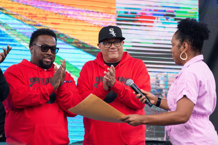 Lt. Gov. Juliana Stratton presents a proclamation to the Chosen Few DJs during the Chosen Few Picnic at Jackson Park in the Woodlawn neighborhood, Saturday, July 8, 2023. | Pat Nabong/Sun-Times