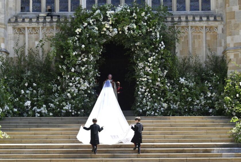 Meghan Markle and her bridal party arrive for the the wedding ceremony. | Ben Birchhall/pool photo via AP