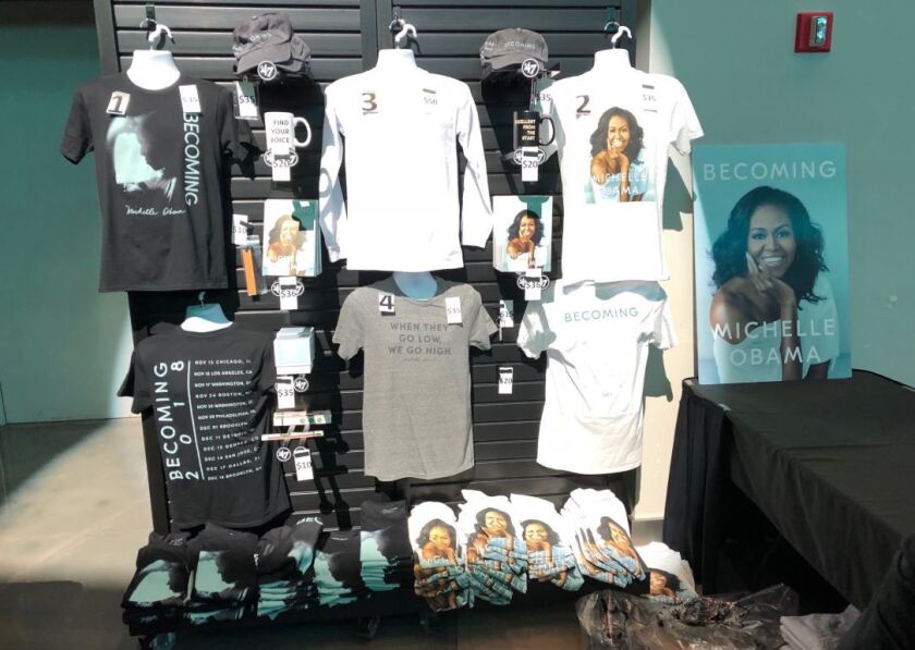 Souvenirs on sale at Michelle Obama book tour kickoff at the United Center. | Lynn Sweet