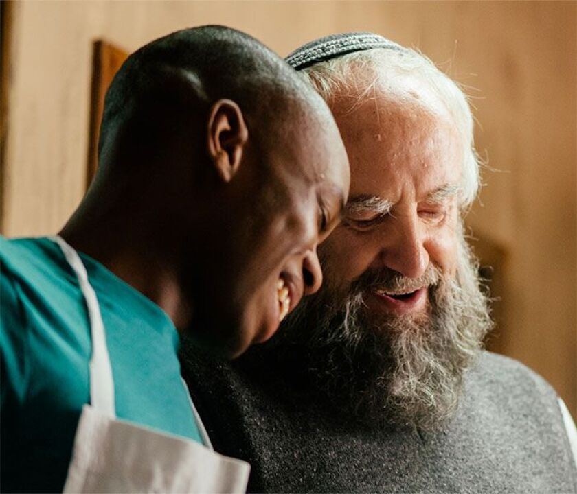 Jerome Holder and Jonathan Pryce in “Dough.” | Provided photo