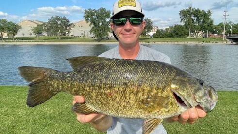 Alex Koepke with a fine smallmouth bass from the Fox River. Provided photo