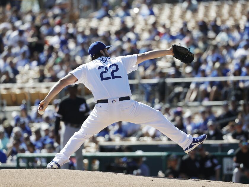 <em>LA’s Clayton Kershaw throws during the first inning.</em>