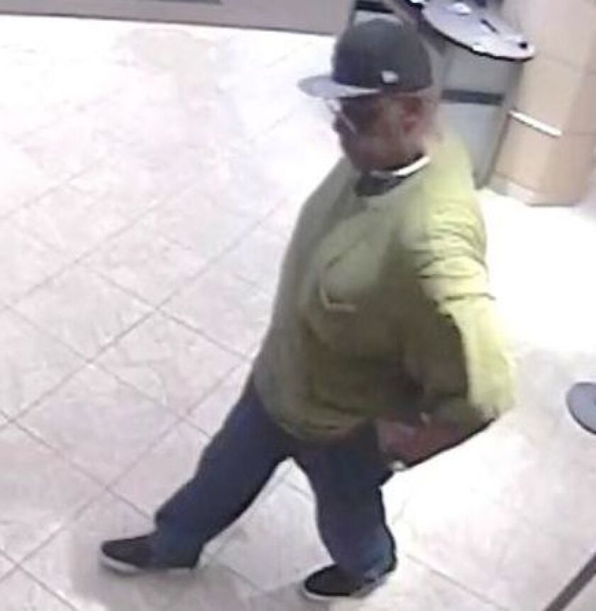 Surveillance photo of the suspect who robbed a Loop bank Monday morning. | FBI photo