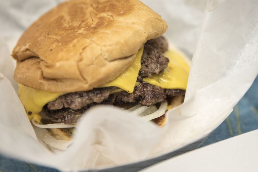 A burger at Edzo’s Burger Shop in Evanston on July 27, 2018. | Ashlee Rezin/Sun-Times