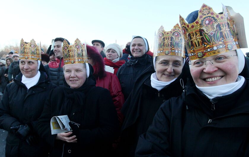 Nuns take part in a traditional Roman Catholic Epiphany procession in the streets of Warsaw, Poland, Tuesday, Jan. 6, 2015. (AP Photo/Czarek Sokolowski)