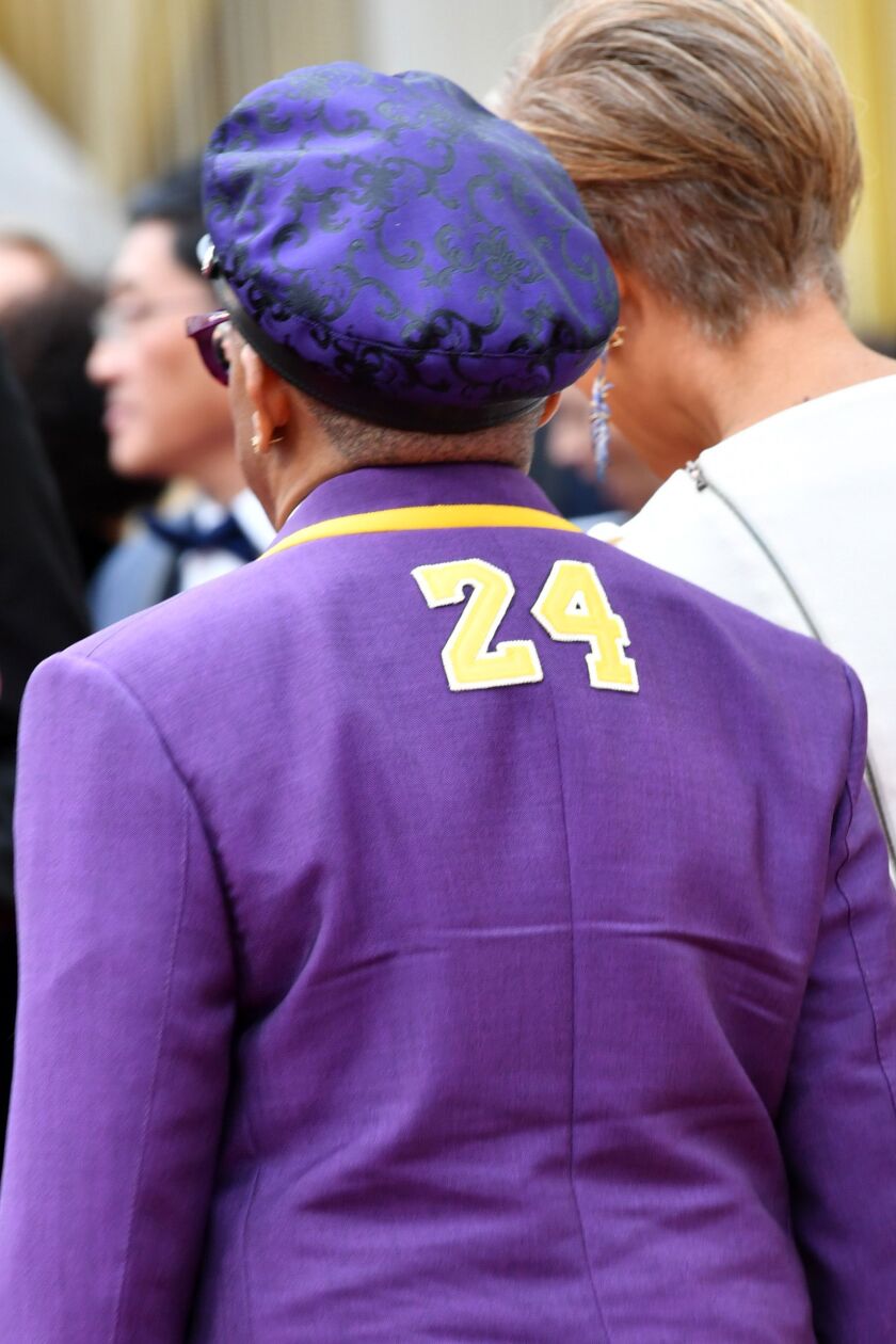 Spike Lee arrives at the Academy Awards on Sunday night, wearing a purple and gold tribute to No. 24, Kobe Bryant.