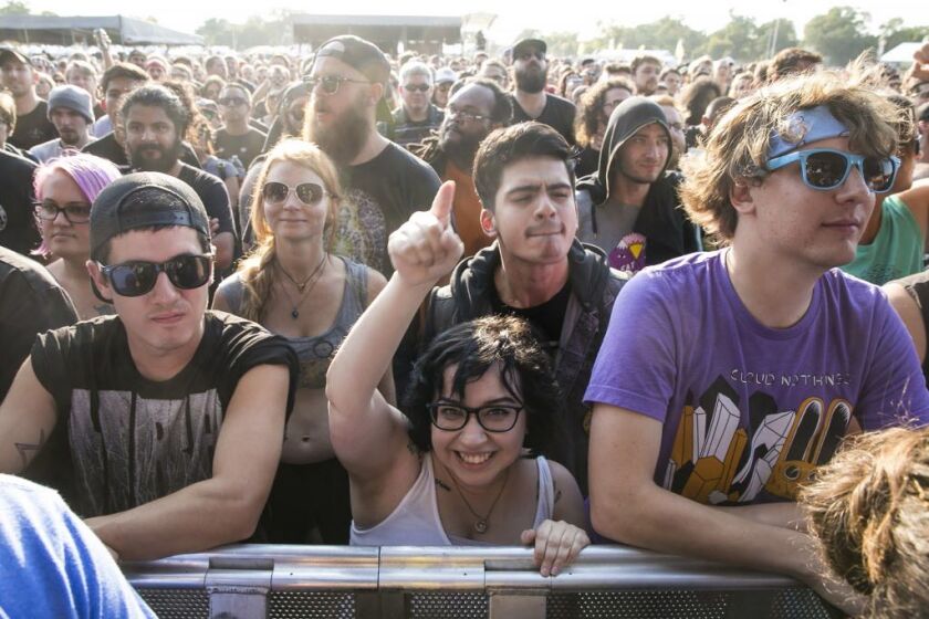 Fans cheer during Death From Above’s performance Friday on Day 1 of Riot Fest at Douglas Park, Sept. 15, 2017. | Ashlee Rezin / Sun-Times