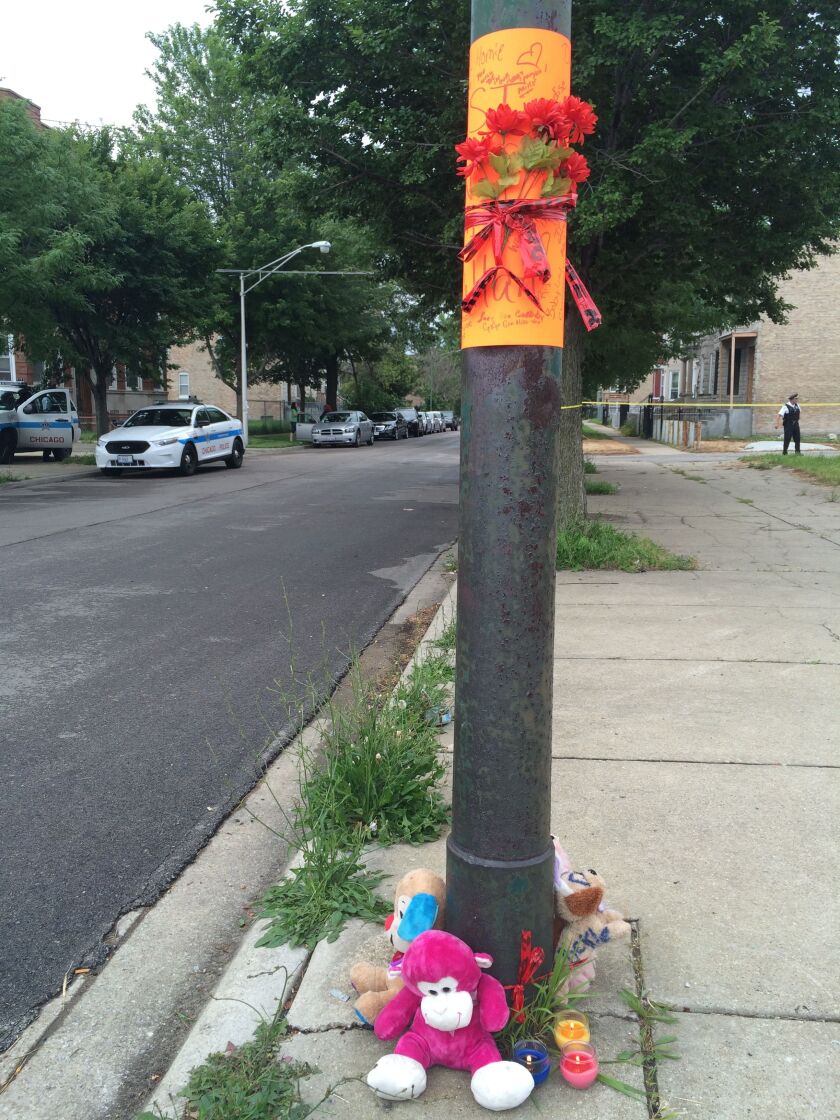 A makeshift memorial on the South Side for 1-year-old Dillan Harris, killed in his stroller Saturday by a car fleeing a gang killing. Becky Schlikerman / Sun-Times