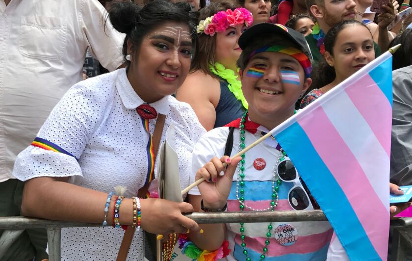 Ana Melendez (left) and Jorden Rodriguez came to the Chicago Pride Parade for their first time Sunday. | Jacob Wittich/Sun-Times