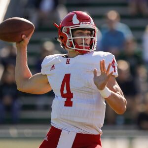 Hinsdale Central’s Michael Brescia (4) looks for an open receiver during the game against Glenbard West.