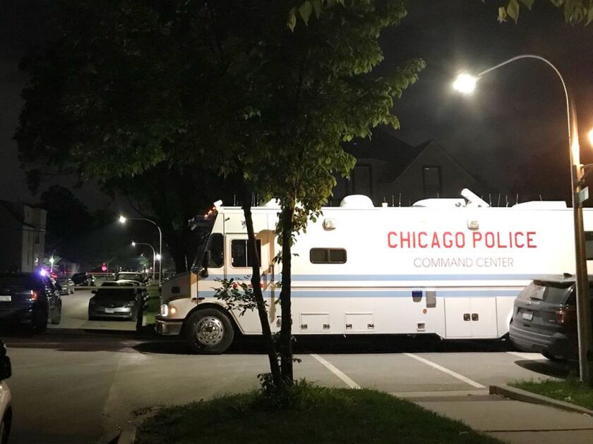 Officers investigate a police-involved shooting in the Austin neighborhood Saturday morning | Tyler LaRiviere/Sun-Times
