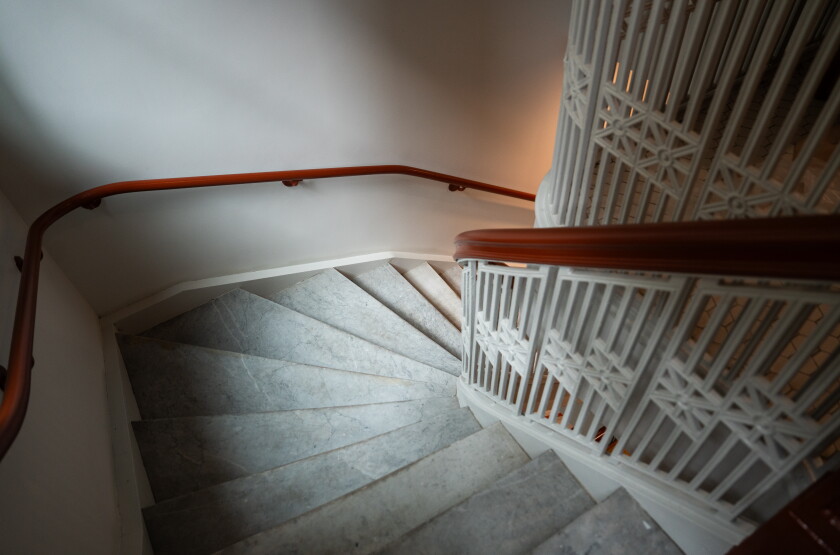 Looking down the staircase, original to the 1905 property, inside the Bellwether Residences in the Loop.