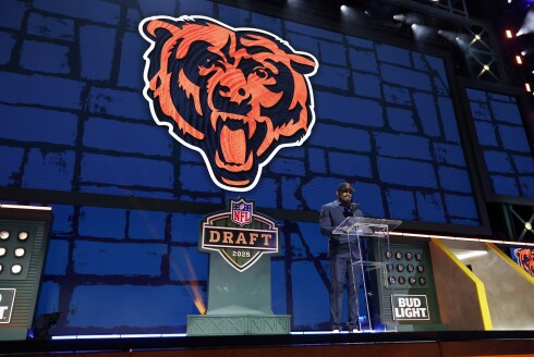 Former Bears player Dez White announces a pick during the second round of the 2025 NFL Draft on Friday, April 25, 2025, in Green Bay, Wisconsin.