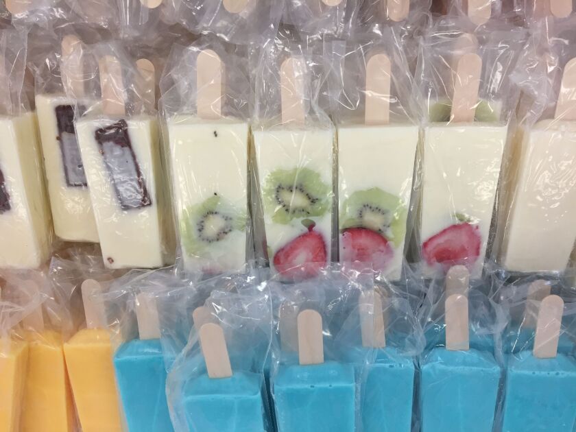 The paleta — homemade frozen pops with fruit embedded in them, in flavors like rice pudding and pineapple with chili — are, like everything at La Michoacana in Highwood, homemade. | Neil Steinberg/Sun-Times