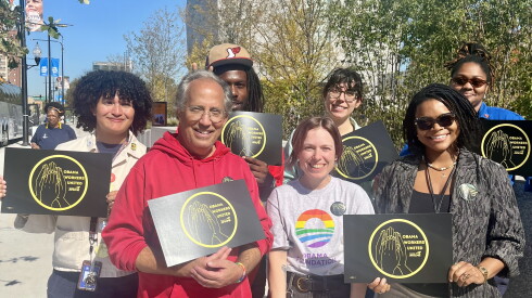 Members of Obama Workers United held an action outside of the museum building on Wednesday to encourage colleagues to sign their union cards.