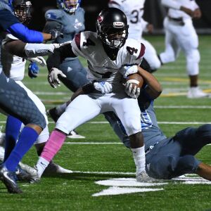 Perspectives’ Colby Cline (4) gets pulled down. Worsom Robinson/For the Sun-Times.