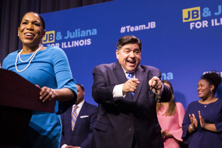 Gubernatorial candidate J.B. Pritzker and his running mate, Juliana Stratton, celebrate their win in the Democratic primary on Tuesday. | Ashlee Rezin/Sun-Times