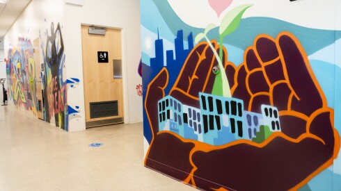 Menace and Resa painted a series of murals at Touch Gift Foundation in Chatham.