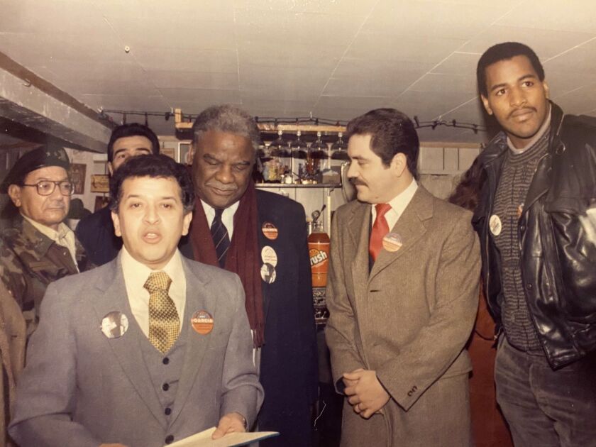Raúl Montes (foreground) with (to his left), former Mayor Harold Washington, U.S. Rep. Jesus “Chuy” Garcia and Richard Dent, the Chicago Bears’ Hall of Fame defensive end.