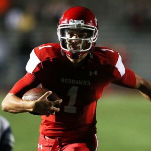 Naperville Central’s Payton Thorne (1) carries the ball for a touchdown. Allen Cunningham/For the Sun-Times.