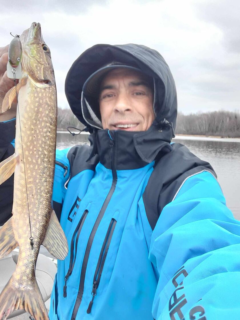 Rob Abouchar holds a northern pike caught from the Wisconsin River. Provided photo