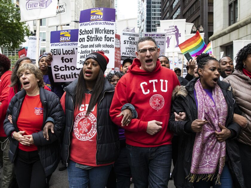 Chicago Teachers Union Vice President Stacy Davis Gates and CTU President Jesse Sharkey lead thousands of striking union members on a march through the Loop, Thursday afternoon, Oct. 17, 2019.