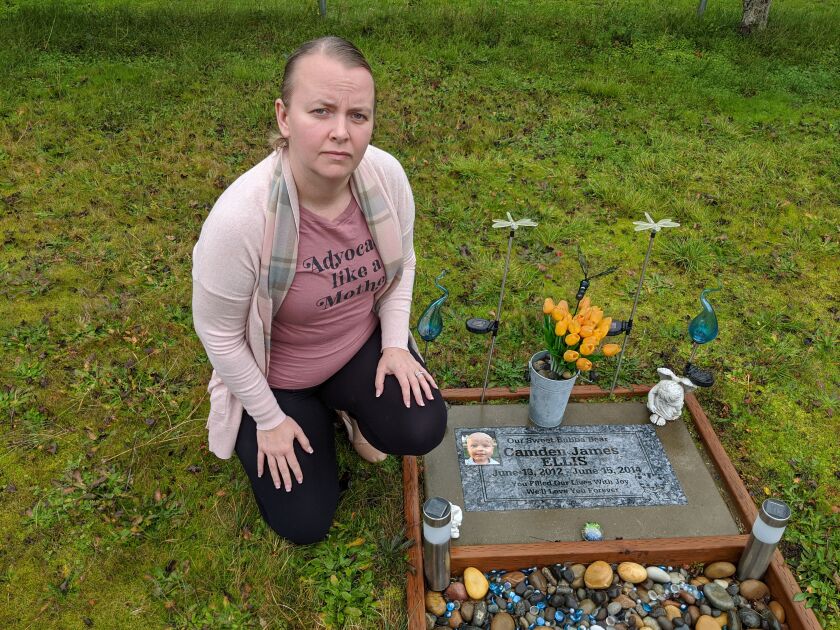 Crystal Ellis at the grave of her son Camden.
