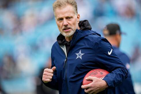 Dallas Cowboys defensive coordinator Matt Eberflus walks on the field before a game against the Carolina Panthers on Sunday, Oct. 12, 2025, in Charlotte, North Carolina.