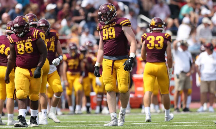 Loyola's Brooks Bahr (99) lines up for the next play when the Ramblers host St. Xavier.