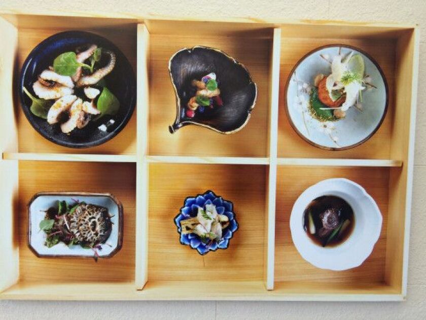 The Grand Menu Bento Box from Charlie Trotter’s. From the exhibit “Charlie Trotter: Chef, Artist, Thinker” at the City Gallery in the Historic Water Tower.| PHOTO BY KIPLING SWEHLA