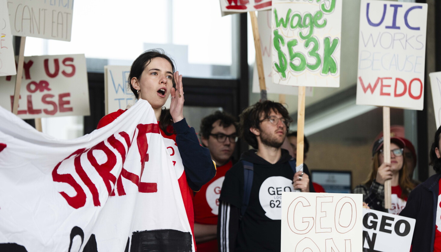 Striking UIC grad workers rally for higher pay as some say they struggle to afford groceries and rent