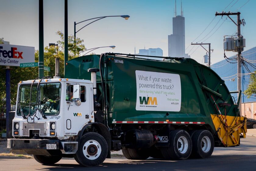 A Waste Management truck heads toward the company’s transfer station on Goose Island. | Better Government Association
