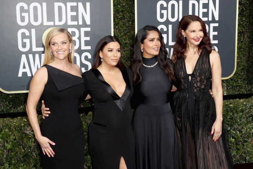 Reese Witherspoon (from left), Eva Longoria, Salma Hayek and Ashley Judd attend The 75th Annual Golden Globe Awards at The Beverly Hilton Hotel on January 7, 2018 in Beverly Hills, California. | Frederick M. Brown/Getty Images\