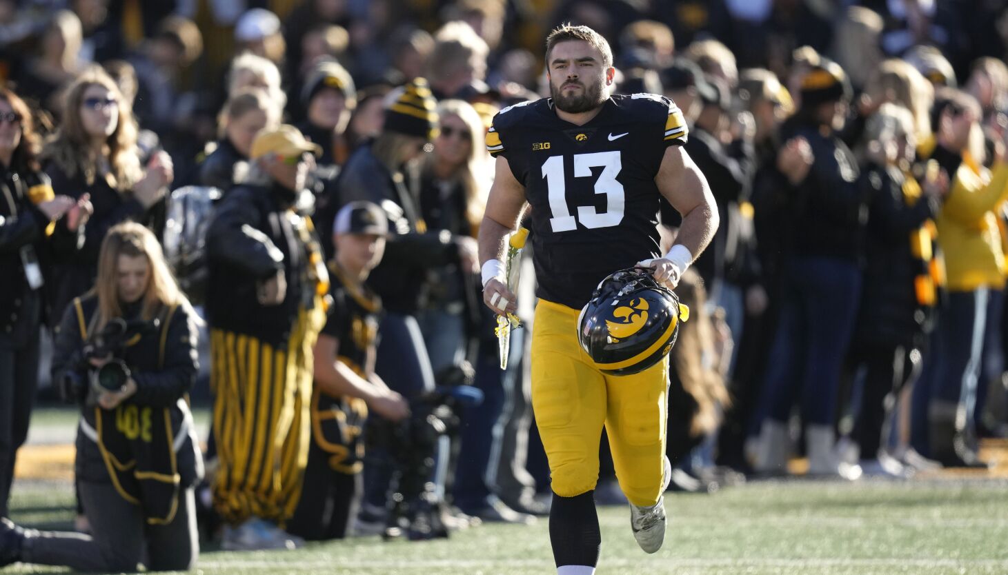 NextImg:Iowa embraces being the underdog against Michigan in the Big Ten title game