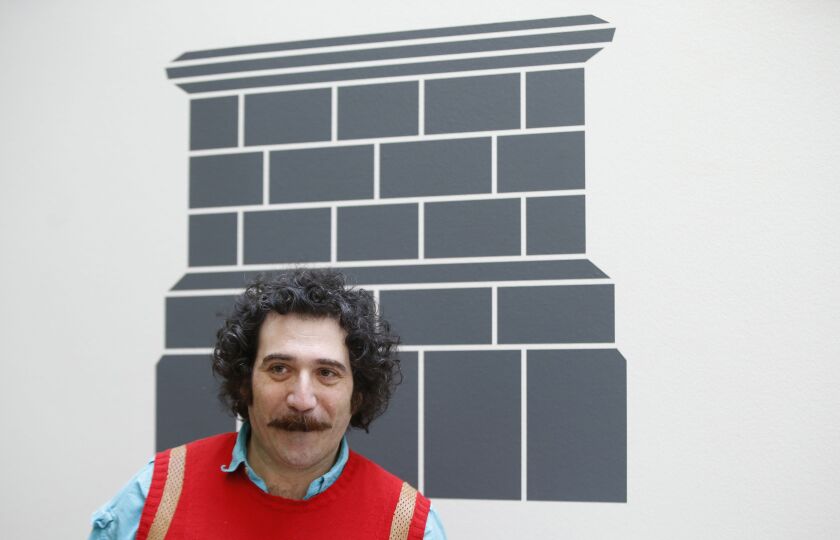 Michael Rakowitz at the National Gallery in London after his design entitled “The Invisible Enemy Should Not Exist” was chosen for one of the next two Fourth Plinth sculptures in Trafalgar Square. | AP