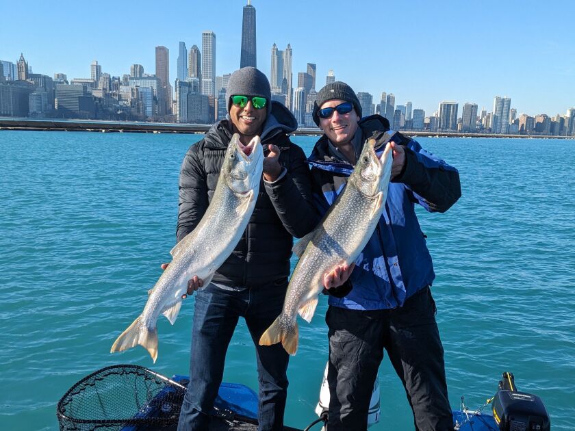 Jason Shaw and Jeff Kopa got one last fishing trip before the storms and cold arrived and had success with lake trout. Provided by Todd Webster