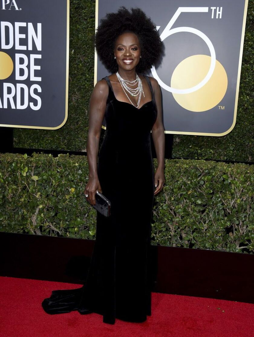 Oscar-winner Viola Davis arrives wearing a Brandon Maxwell gown at the 75th annual Golden Globe Awards at the Beverly Hilton Hotel on Sunday, Jan. 7, 2018, in Beverly Hills, Calif. | Jordan Strauss/Invision/AP