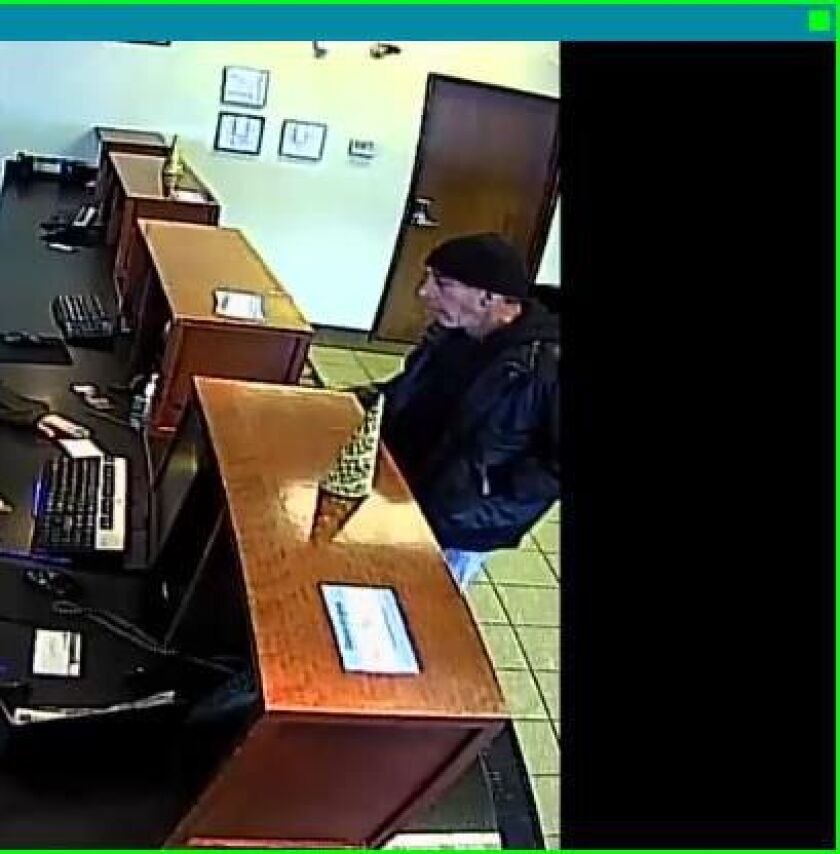 A surveillance photo of the suspect who robbed a Byline Bank branch Thursday afternoon in Roscoe Village. | FBI