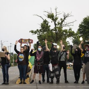 Protesters block traffic as they peacefully march around Kenosha on the fourth day of civil unrest after police shot Jacob Blake, Wednesday night, Aug. 26, 2020.