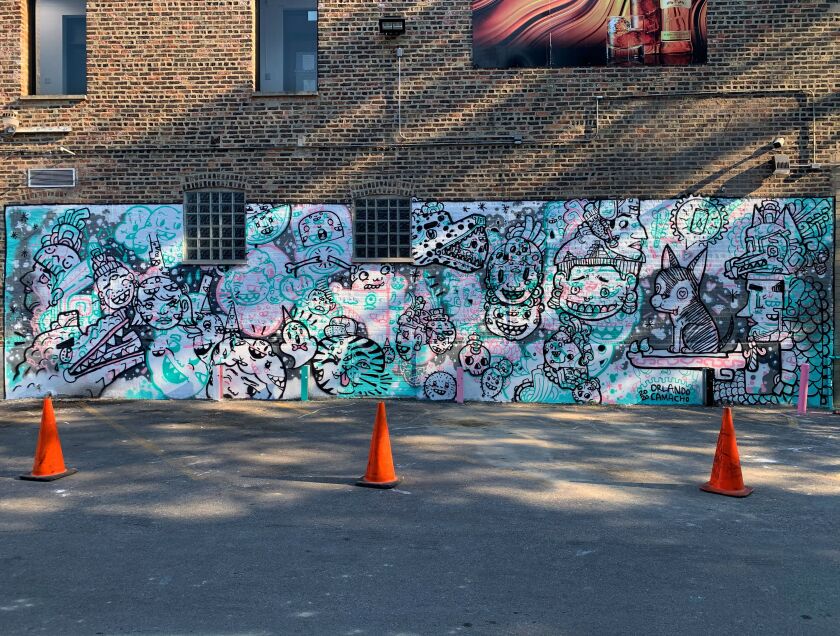 A mural by Orlando Camacho on the wall of the parking-lot patio at Osito’s Tap near 26th Street and Ridgeway Avenue in Little Village.