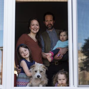 The Anderes family stands together inside their home, Thursday, April 30, 2020.