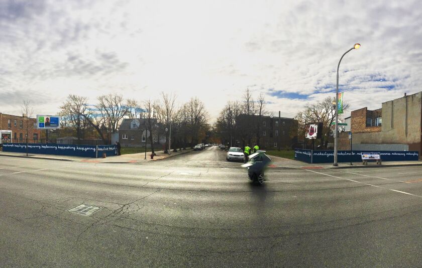 Fences at Chicago and St. Louis avenues are covered with artist Matthew Hoffman’s motivational sayings such as “keep learning” and “keep pushing” and “keep growing.”
