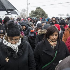 Hundreds of mourners pay their respects at a prayer vigil for the five people killed two days earlier in a mass shooting at the Henry Pratt Company in Aurora, Sunday afternoon, Feb. 17, 2019. | Ashlee Rezin/Sun-Times