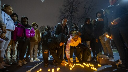 Friends of Armani Floyd set up a small memorial for him in a basketball court outside Gary Comer College Prep Middle School in the Grand Crossing neighborhood, Monday, Nov. 24, 2025.