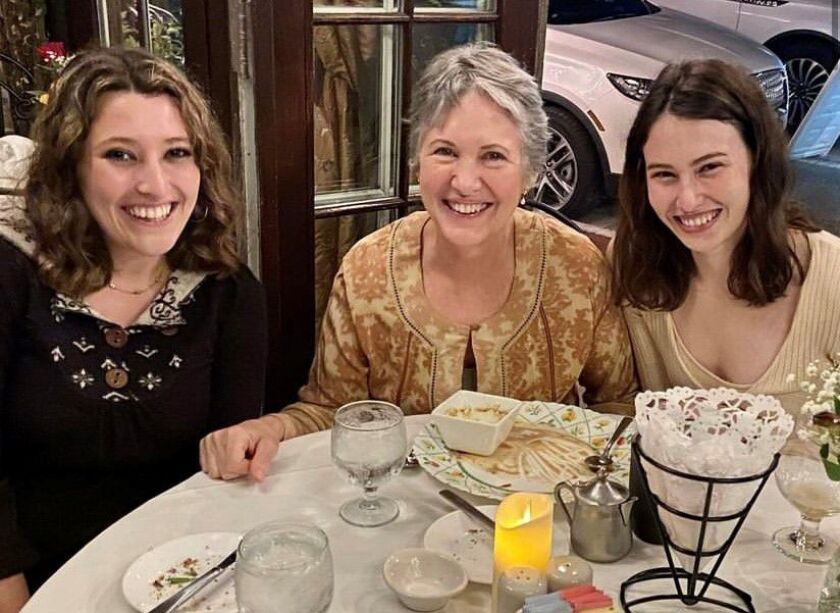 Katherine Goldstein (center), 64, of Highland Park, pictured with her daughters.