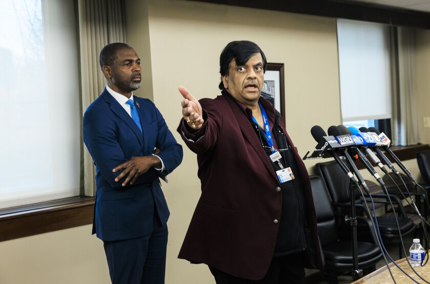 State Rep. La Shawn K. Ford looks on as Resilience Healthcare CEO Manoj Prasad explains the financial situation at West Suburban Medical Center during a news conference Wednesday about the hospital’s temporary closure and plans to try to reopen it.