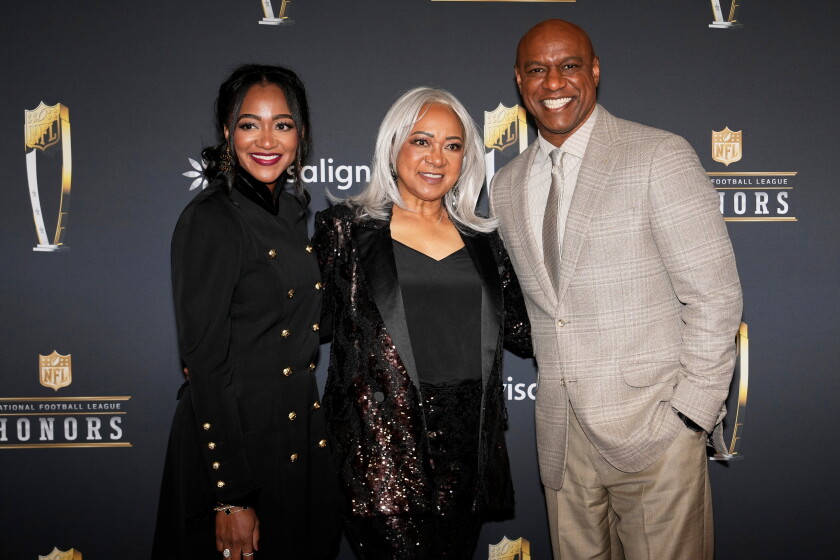 Jarrett Payton, with his mother, Connie, and his sister, Brittney, arrive for the NFL Honors award show Feb. 5 in San Francisco.