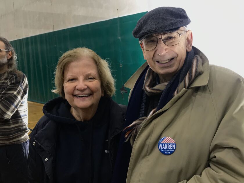 Julie Donalek with her husband, Peter, at Sen. Elizabeth Warren’s town hall Saturday night in Edgewater.