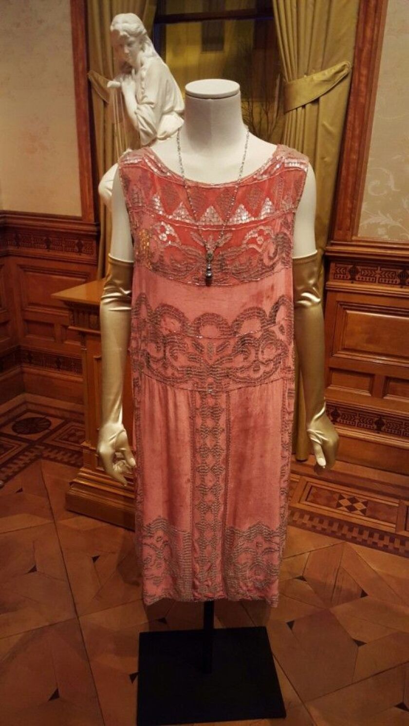 Lady Rose MacLare (Lily James), silk velvet evening dress, original to the period, with glass bead and sequin decoration. | PHOTO BY MIRIAM DI NUNZIO/SUN-TIMES