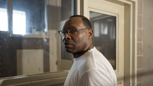Ivy Kelly, who is incarcerated at Division 9 of the Cook County Department of Corrections and maintains his innocence after serving 26 years, stands in a room where attorneys speak to their clients, Friday, June 12, 2026. Kelly was offered to walk free if he pleaded guilty to murdering his best friend. He denied the offer and maintains his innocence.